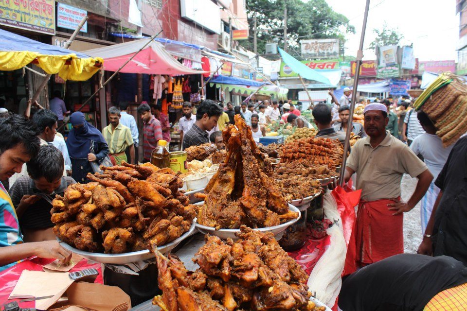 Tables groaning with food at a community iftaar in Dhaka, Bangladesh during Ramadan last year.
