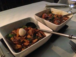 Opium Thai's chilli chicken stir-fry and lemongrass and ginger fish.
