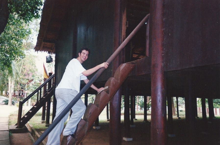 Climbing into the Sarawak House at Mini Malaysia