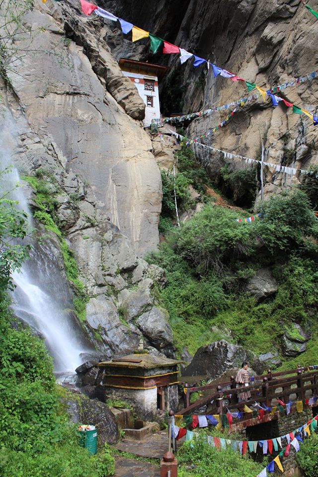 Waterfall and Singye Pelphu Lhakhang (Snow Lion Cave Meditation Retreat) near Taktshang Goemba (Tiger's Nest Monastery)