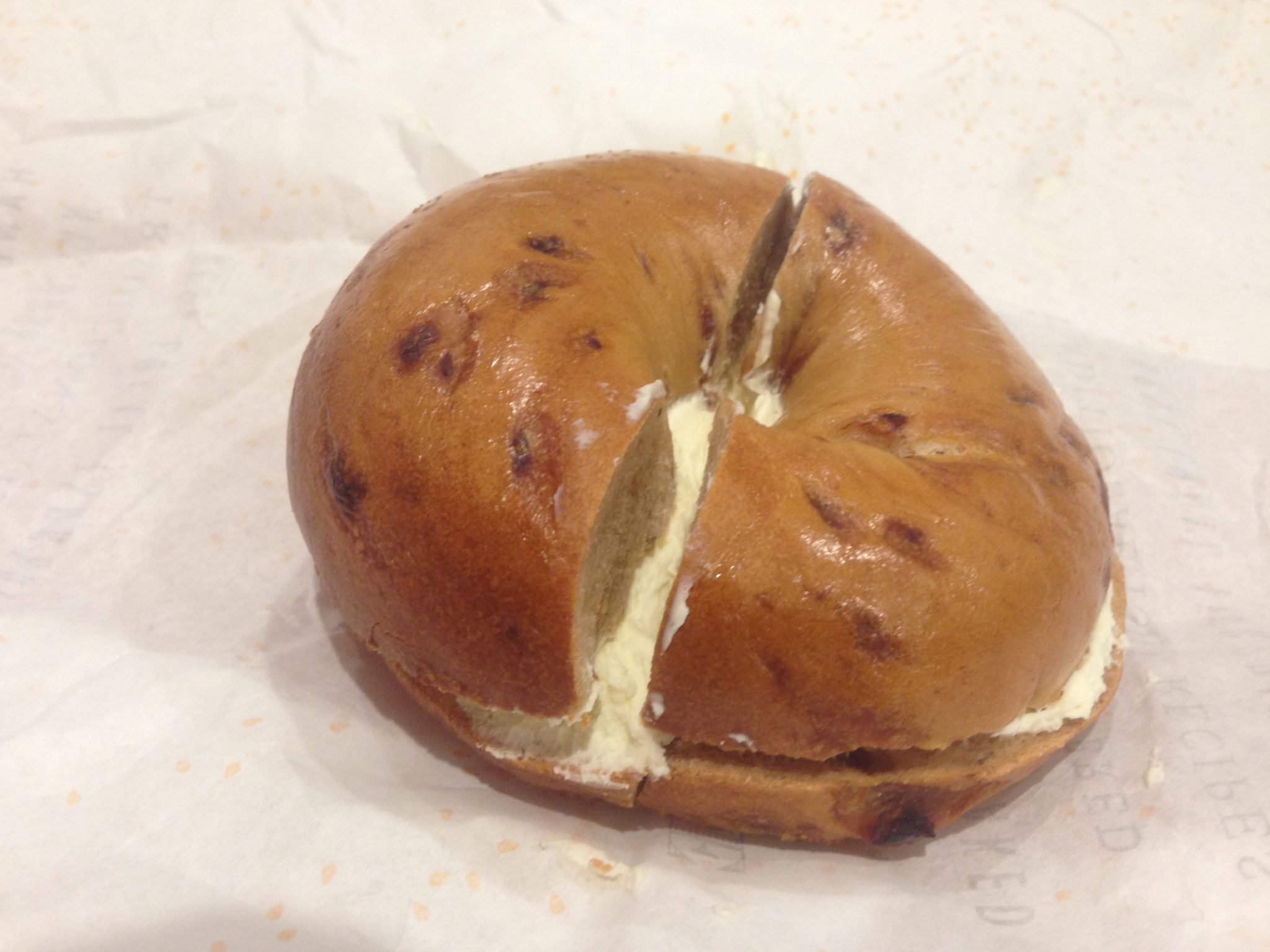 5 and Dime cinnamon and raisin bagel with cream cheese