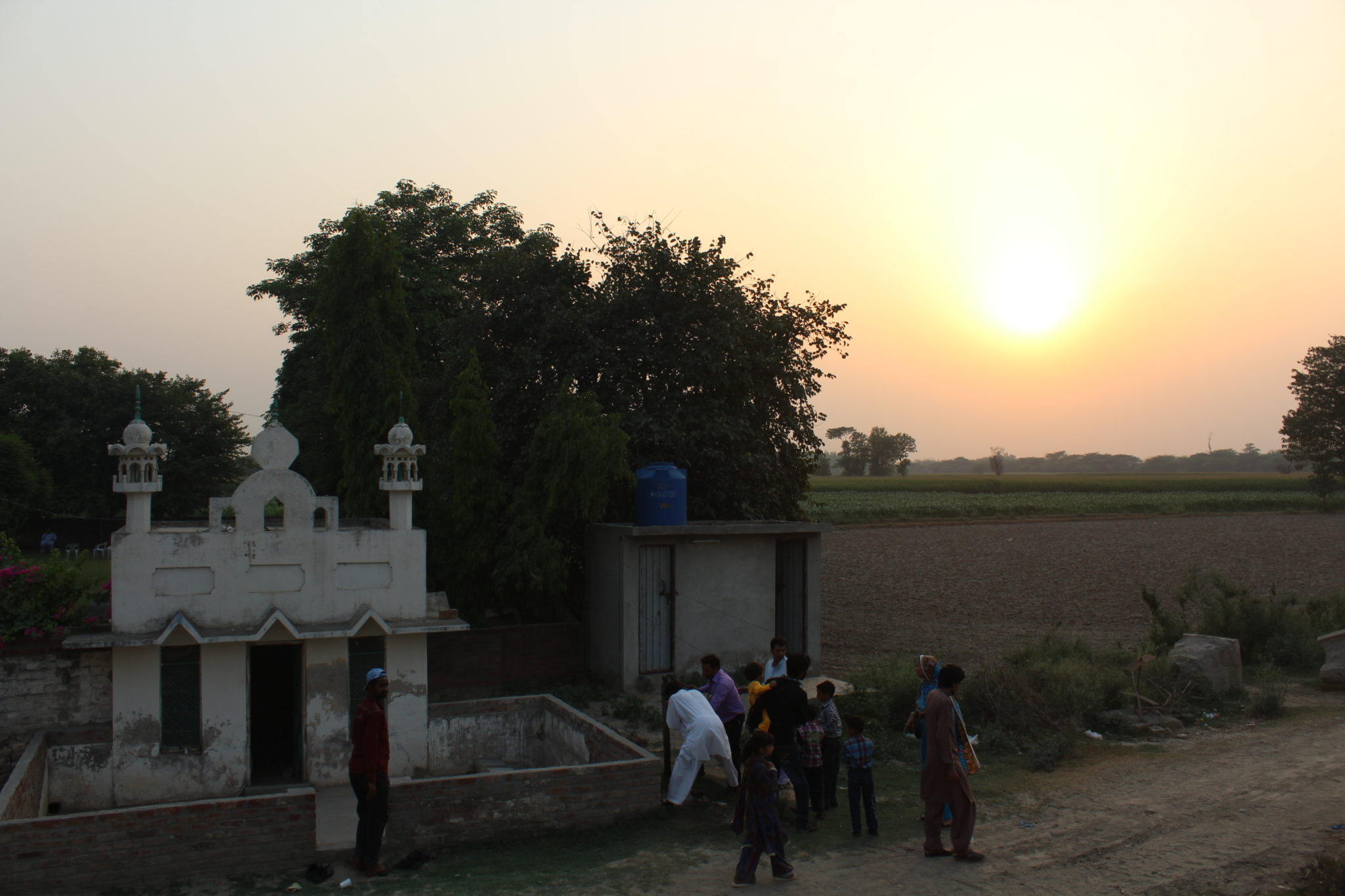 The sun sets over Pakistan, and the first mosque across the border