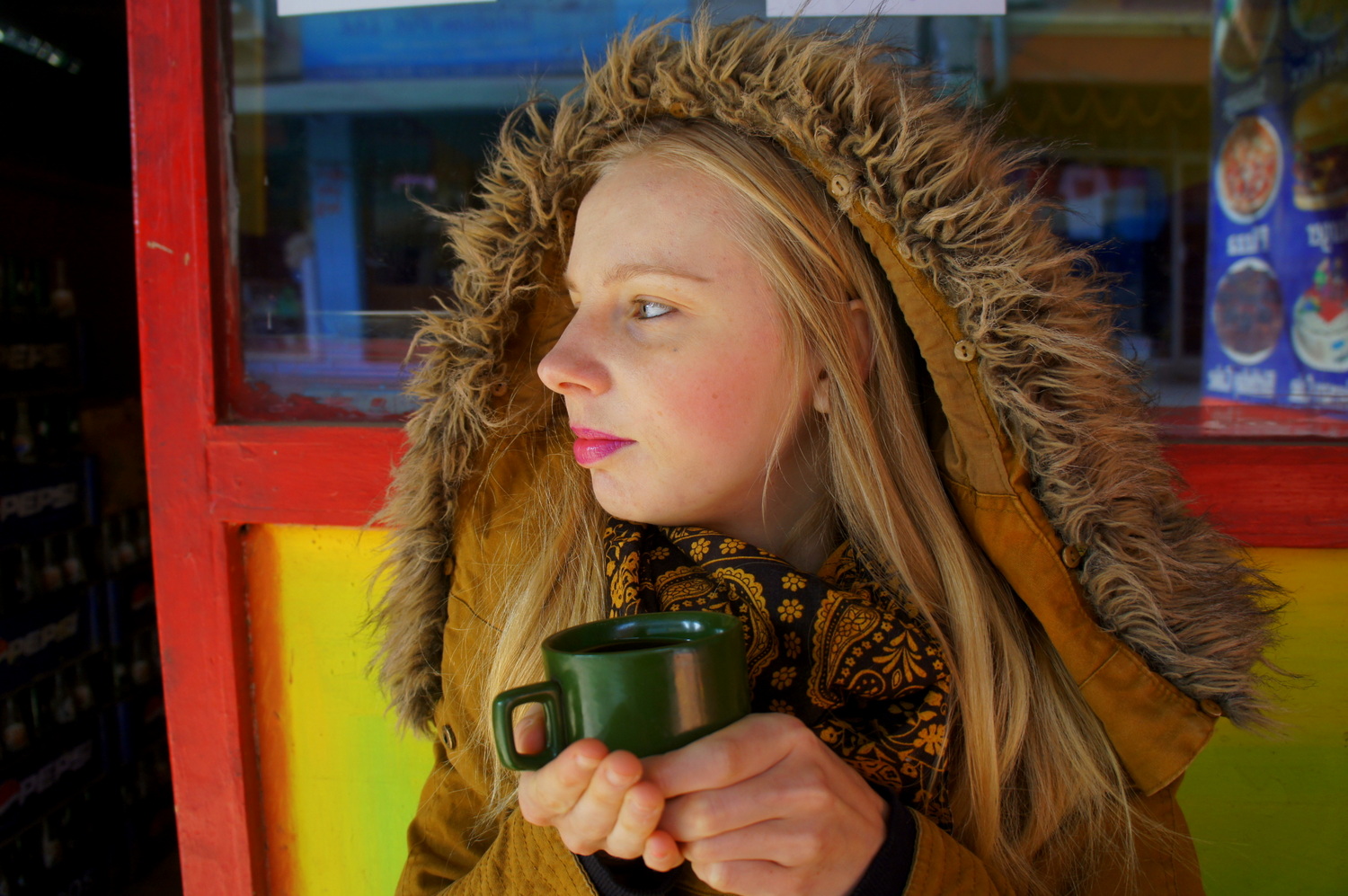 Agness Walewinder wraps her hands around a warm cup on a rather chilly morning!