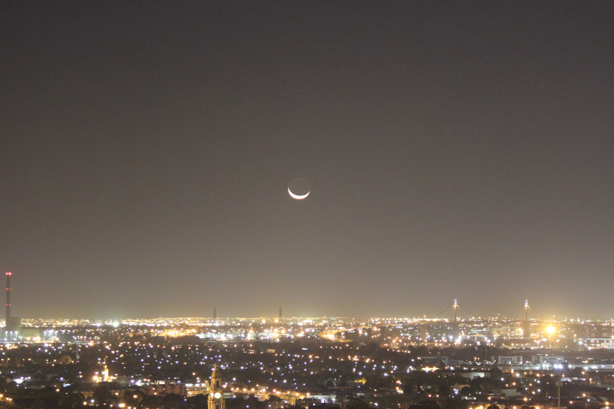 The Eid moon rises over Melbourne's west at the end of Ramadan 2014.