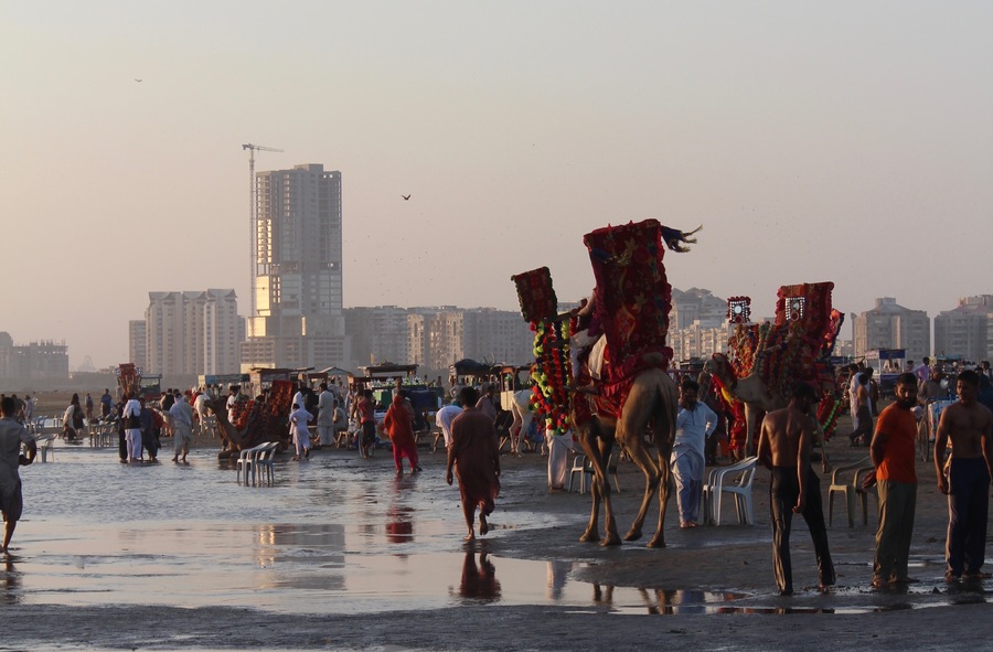 Rituals of time on Clifton Beach, Karachi